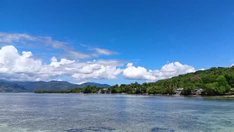 Seascapes-of-Karampuang-Island-in-Mamuju,-West-Sulawesi,-Indonesia_tilt-down-shot