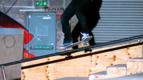 skater doing crook slide down rail