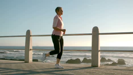 old sporty woman doing a jogging