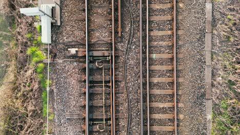 Overhead-shot-of-railway-lines-slowly-revealing-longer-part-of-track