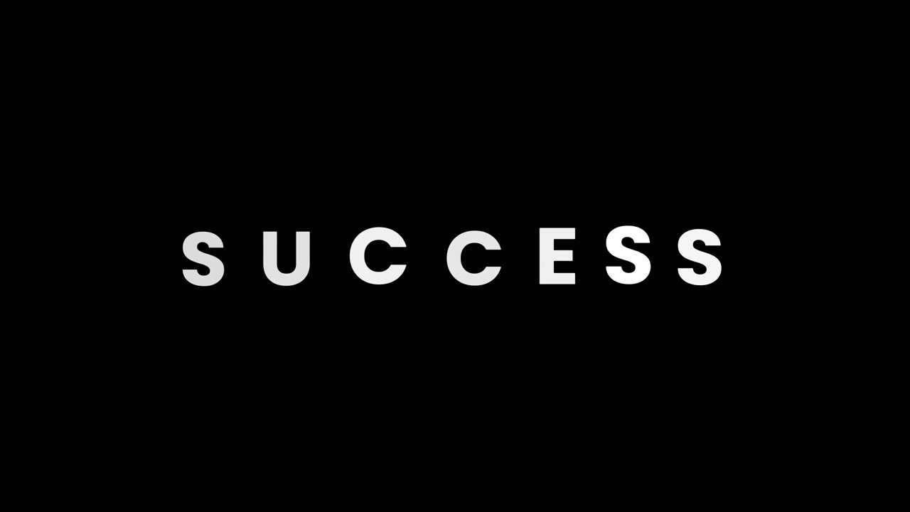 Animeret tekst 'Succes' vises på sort baggrund.