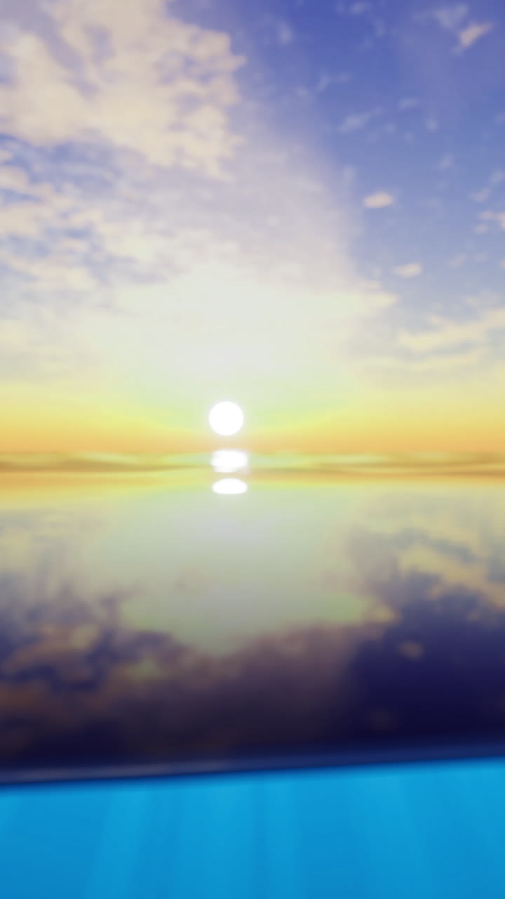 Sunset over calm ocean waters reflecting colorful sky at twilight