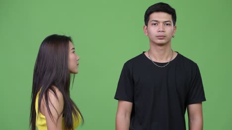 Young happy Asian couple together