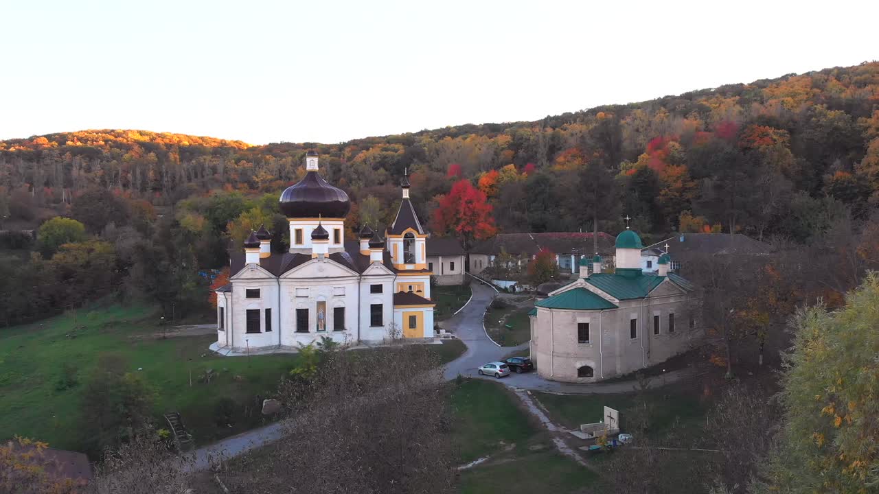 Scenic Autumn View of a Church and Monastery