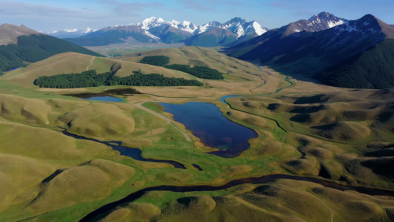 Aerial View of a Mountain Valley with Lakes and Rivers