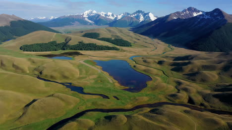 aerial view of a mountain valley with lakes and rivers