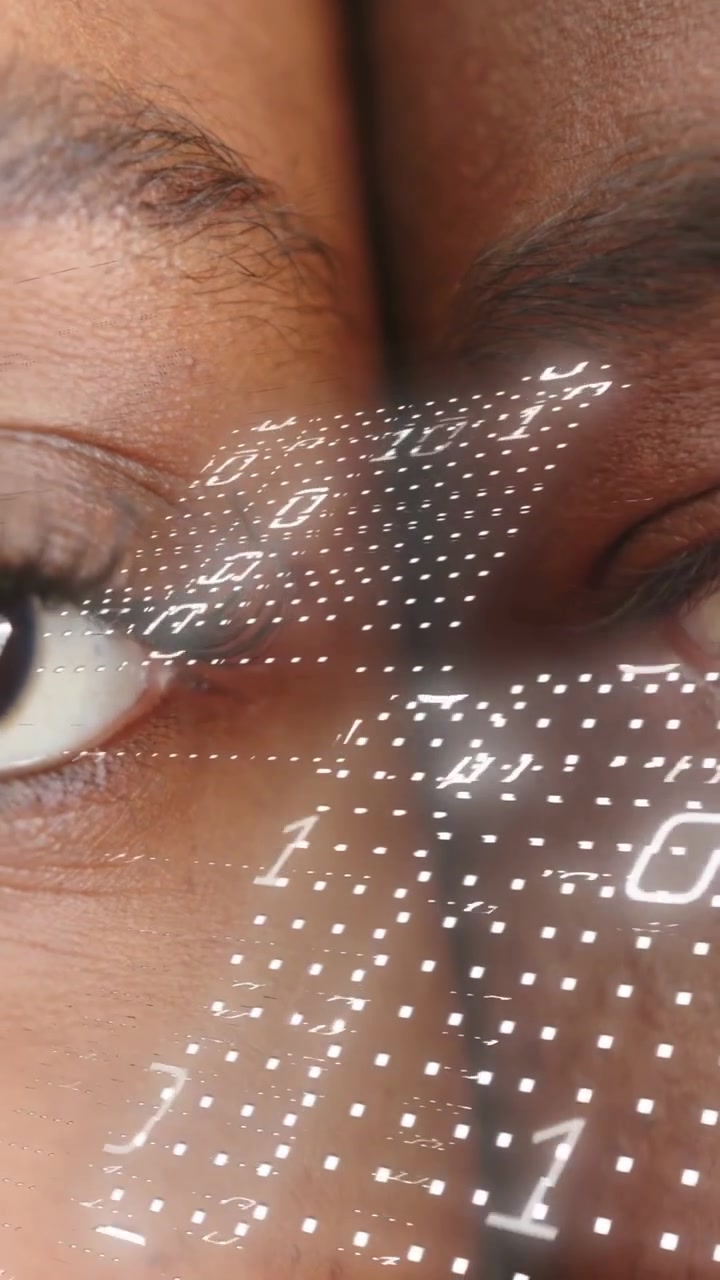 Vertical video: Couple pressing faces, projector starting right and scanning binary dots for AI