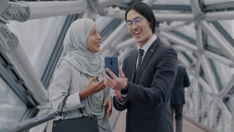 businesspeople collaborating on a bridge
