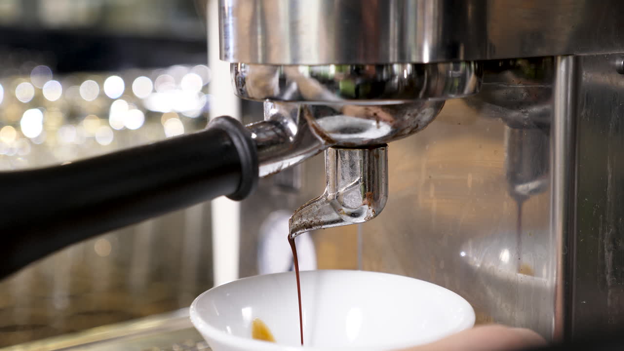 Espresso being brewed from a machine