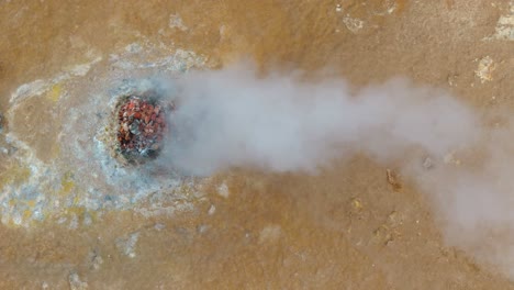 hot volcanic underground lava, steaming heat from the earth in iceland top down aerial view