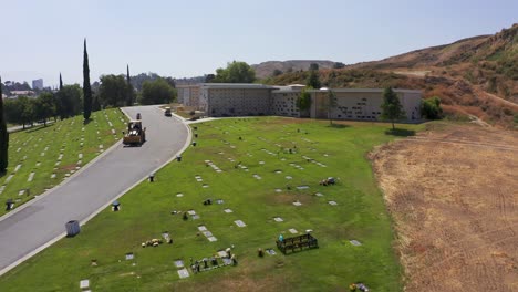 Low-push-in-aerial-shot-of-a-stone-mausoleum-at-a-mortuary-in-California