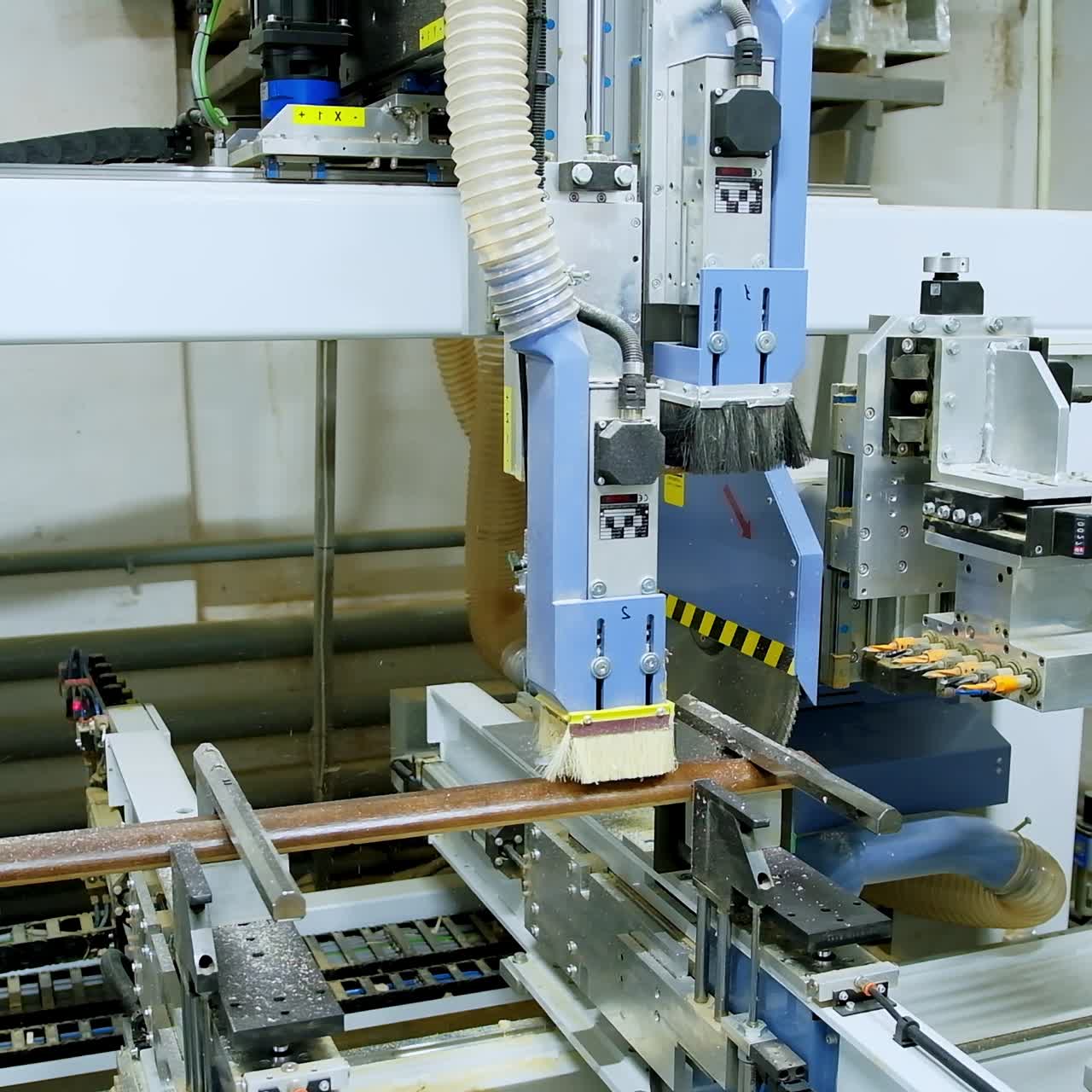 Industrial machine making wooden doors. Automated device for door production in the workshop. Modern industry.