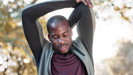 Black-man,-stretching-arms-and-fitness-in-park