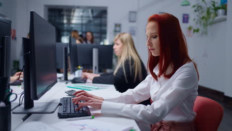 businesswoman working at her desk in an office