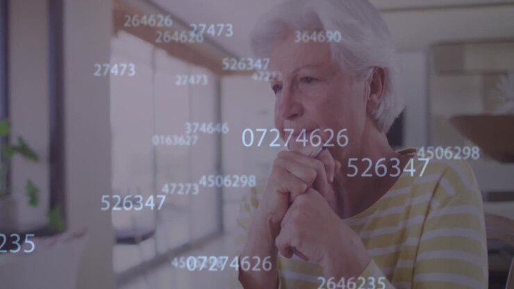 Animation of numbers processing over thoughtful caucasian senior woman leaning on at home