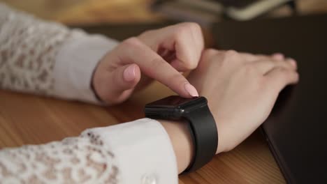 woman using a smartwatch
