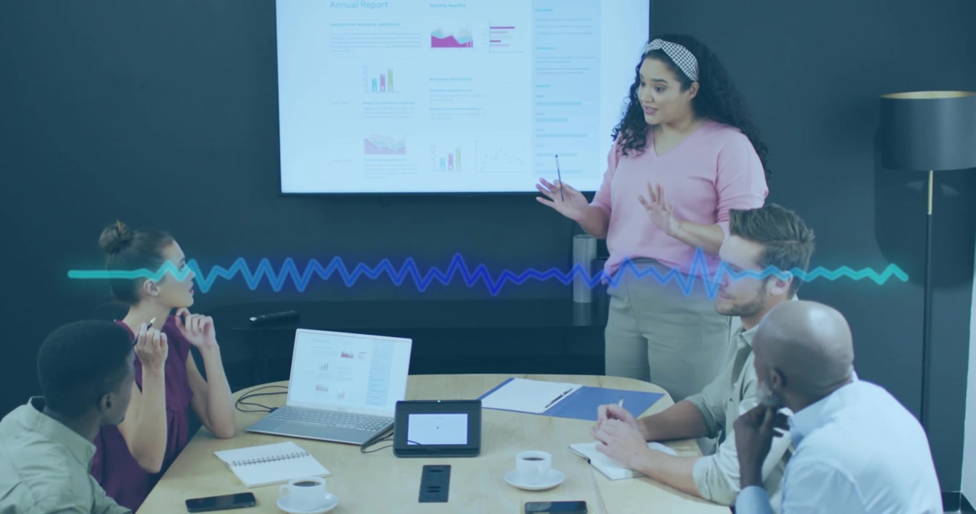 Diverse Business Team in a Collaborative Meeting with Data Visualization