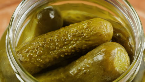 pickled cucumbers in a glass jar