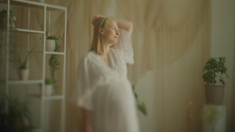 Pregnant Woman Holding Gypsophila Bouquet