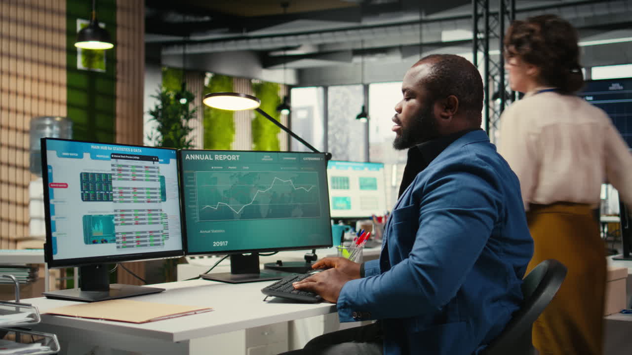 Vertical Video Black businessman correcting his bad posture at the workstation