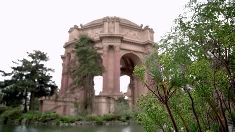 scenic view of an art museum by a pond