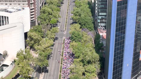 aerial shot of woman’s demonstration day in mexico city at paseo de la reforma avenue