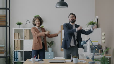 business people dancing in office