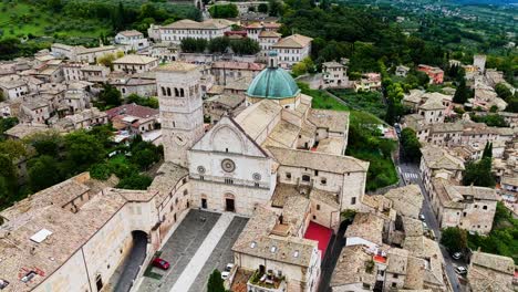 front facade and entrance of assisi cathedral in assisi, italy