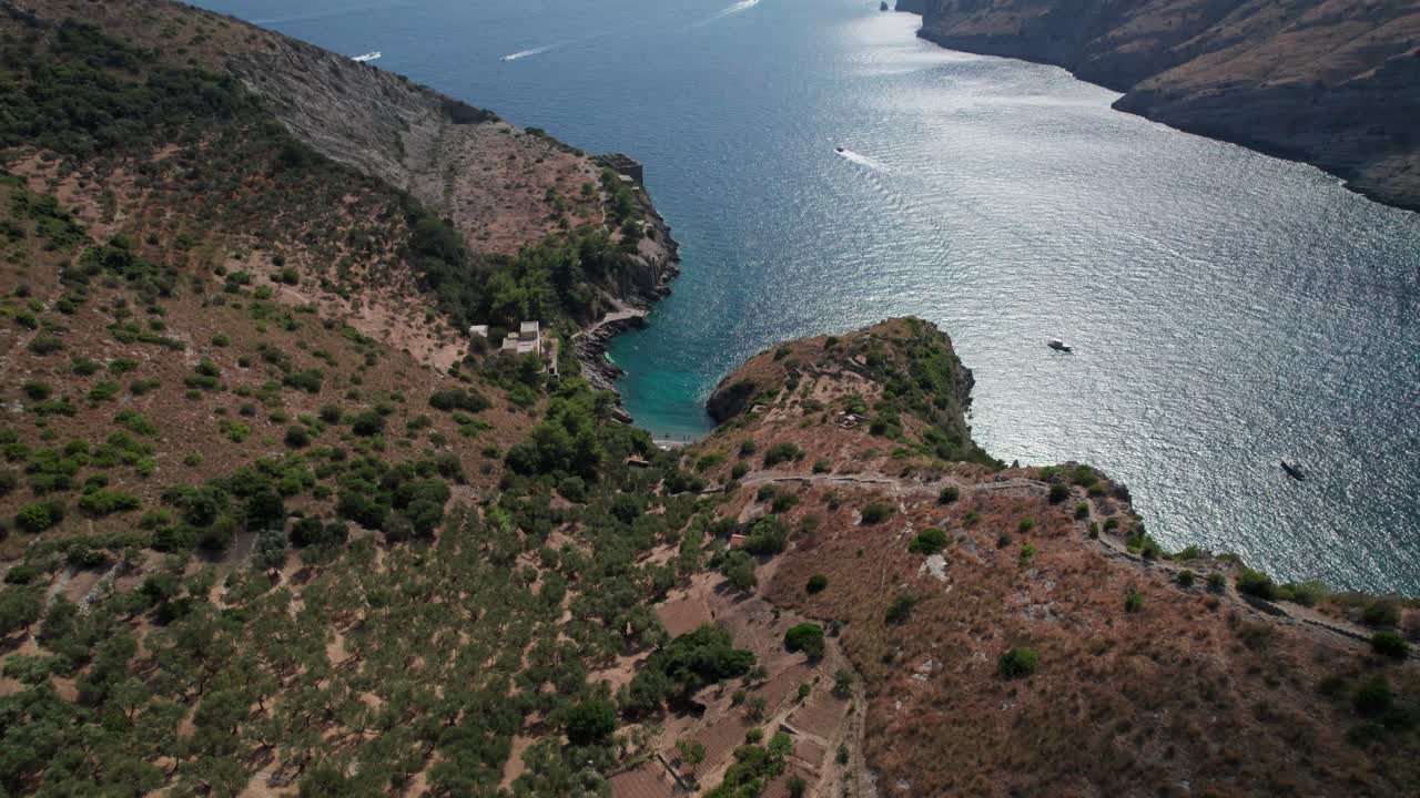Aerial top down view of Ieranto bay. Salerno gulf. Italy. Daylight