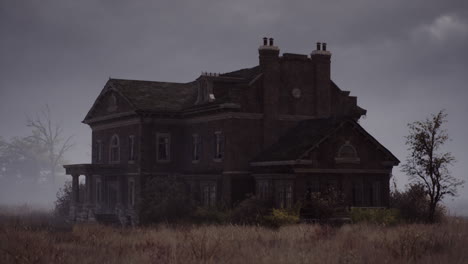 abandoned victorian house in a foggy field