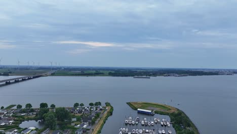 aerial footage of boats, buildings, bridges and traffic