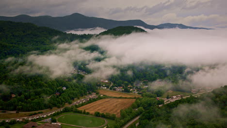 the haunting calm of fog-covered smoky ridges, seen from above