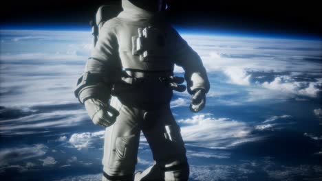 Astronauta-En-El-Espacio-Ultraterrestre-Contra-El-Telón-De-Fondo-Del-Planeta-Tierra.-Imagen-De-La-Tierra-Provista-Por-La-Nasa