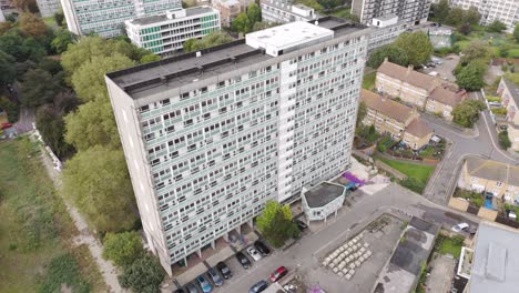 aerial view of a highrise apartment building in a city