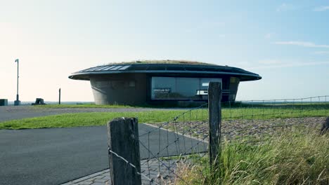 unusual round building in a field