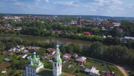 aerial view of a russian town with river and churches