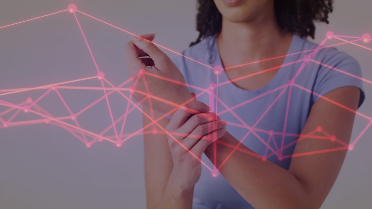 Interacting with animation, woman using digital network interface on wrist