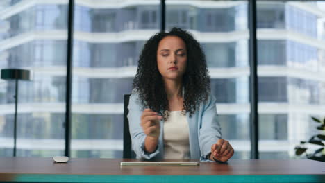 Futuristic-businesswoman-using-transparent-display-office.-Woman-checking-data