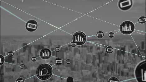 Animation-of-network-of-digital-icons-against-aerial-view-of-cityscape