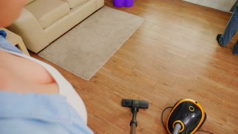 pov of woman vacuuming