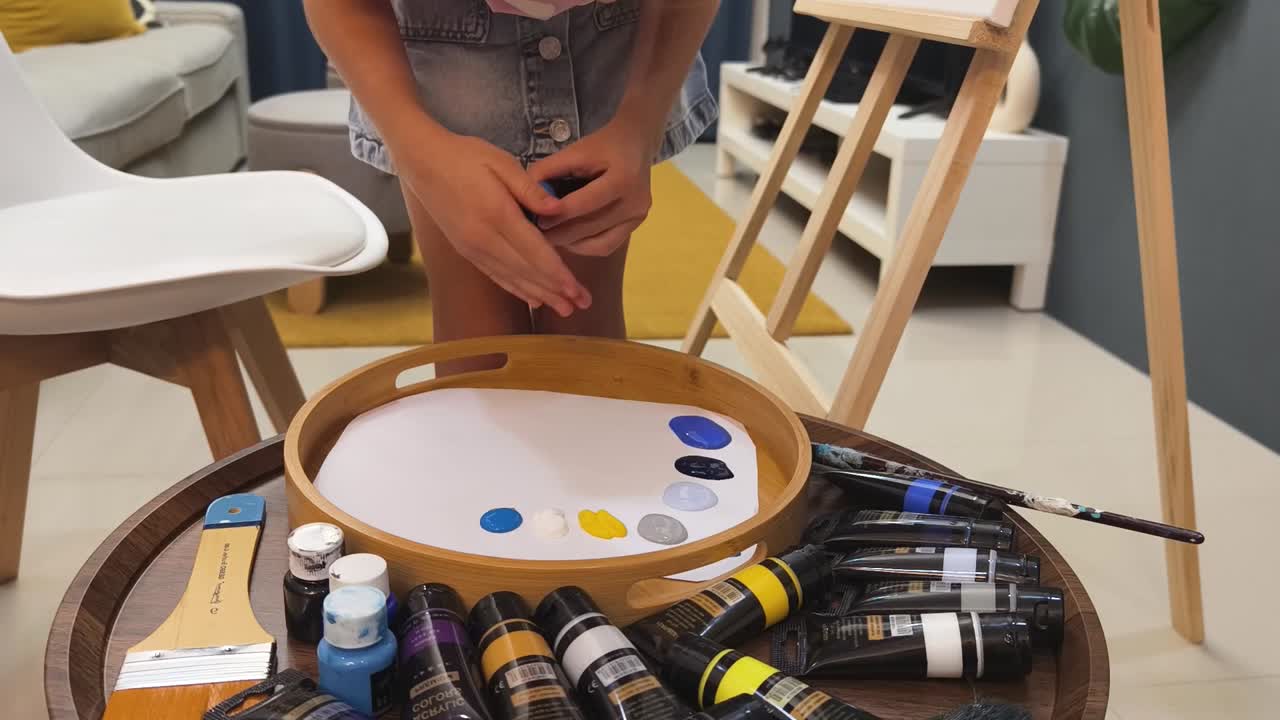 Child Painting with Acrylic Paints