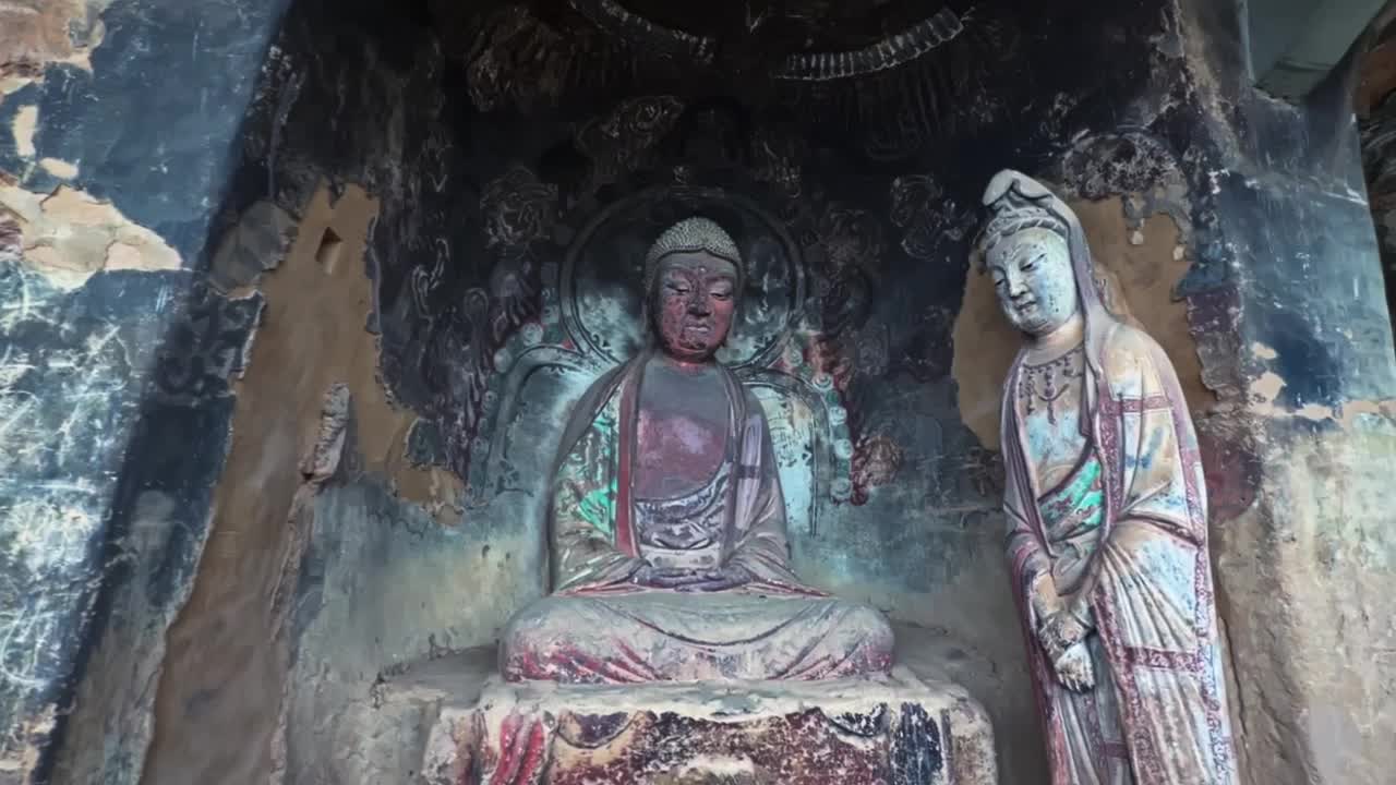 Ancient Buddhist Sculptures Within The Maijishan Grottoes In Tianshui, Gansu Province, Northwest China. Tracking Shot