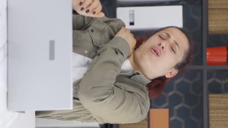 vertical video of business woman with aching shoulders is bored.