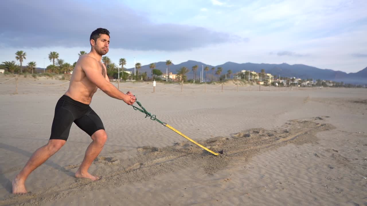 ejercicio dinámico de arrastre del peso de la parte superior del cuerpo