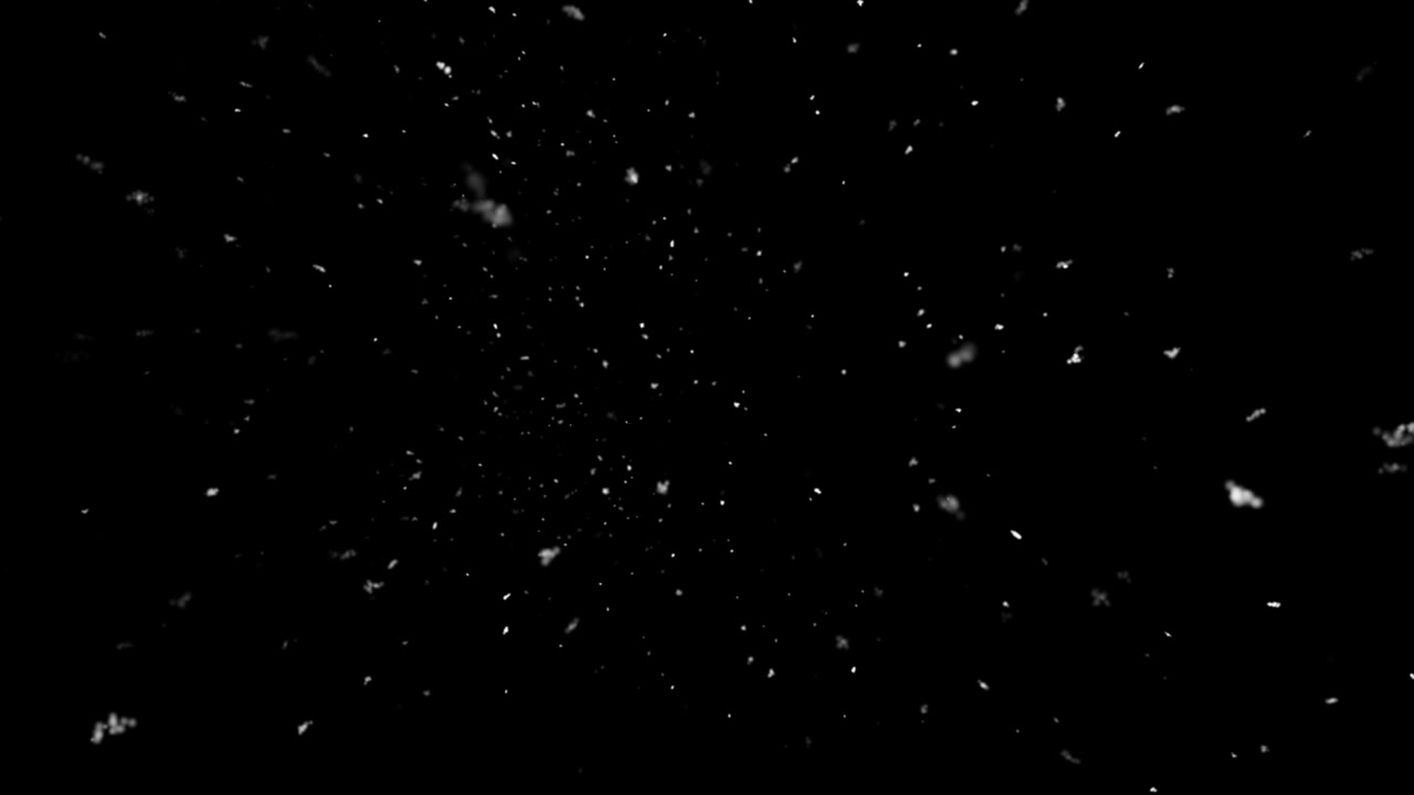 Realistic snow particles of various sizes and depths fall towards ...