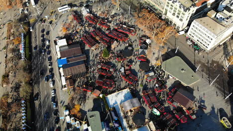 Drone-shot-around-the-Christmas-Market-in-Zurich,-Switzerland