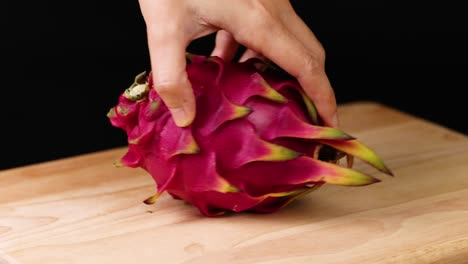 dragon fruit spins on a wooden board