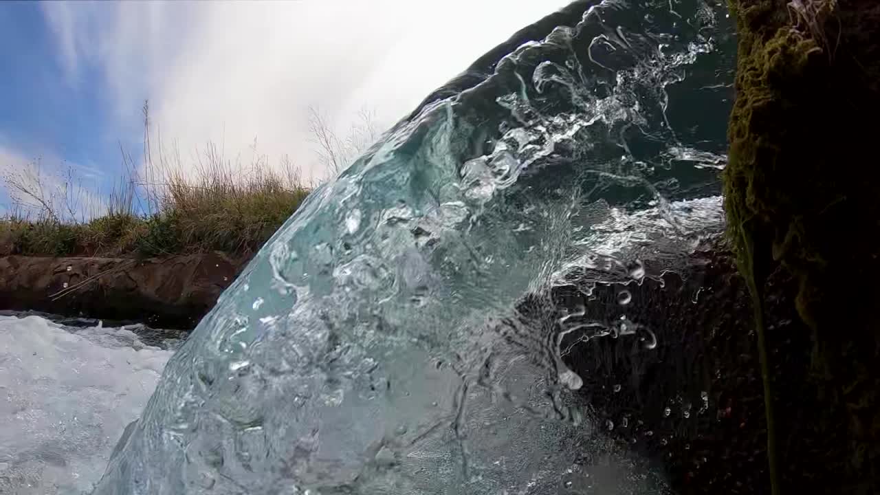 Waterfall series shot on a spring fed canal in western Texas. Series contains mostly slow motion scenes of a small waterfall including spectacular underwater footage with aquatic wildlife