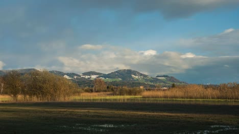 snow covered backtel mountain in wetzikon switzerland at sunset, time lapse