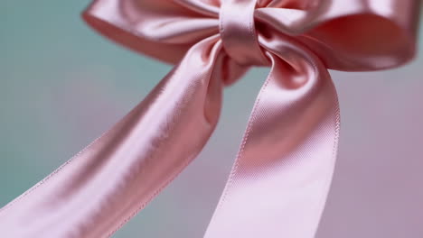 elegant pink satin bow close-up